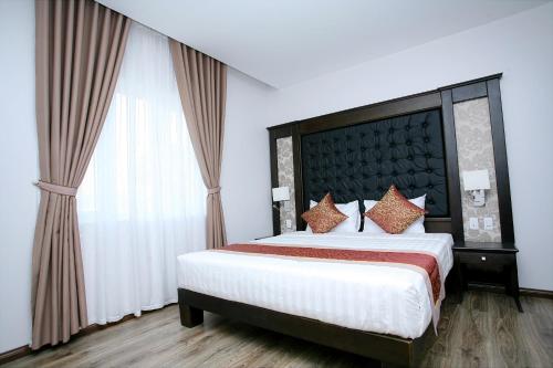 Katil atau katil-katil dalam bilik di Ha Long Park Hotel