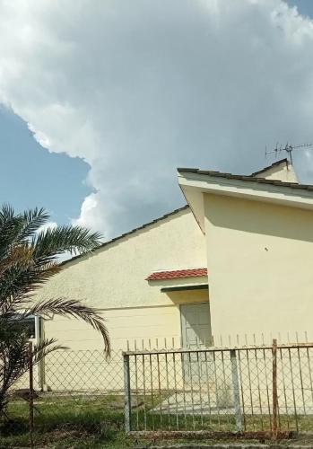 a house with a fence in front of it at Roomstay Dekat Pekan in Kangar