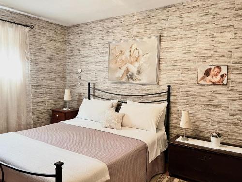 Postel nebo postele na pokoji v ubytování Holiday Home in Sicily near Mount Etna