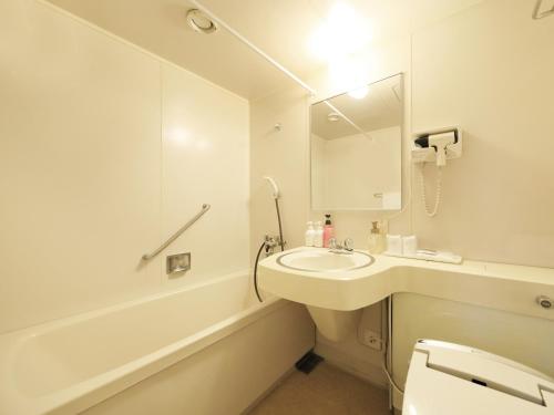 Kylpyhuone majoituspaikassa Hamanoyu