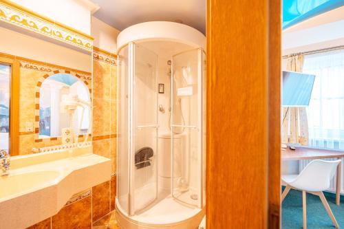 Koupelna v ubytování Hotel Plankl