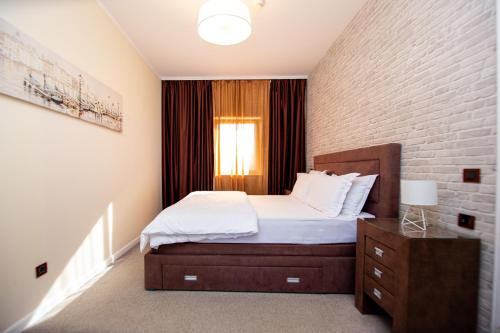 Postel nebo postele na pokoji v ubytování Hotel Opera Jaz