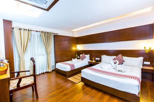 Kathmandu Suite Homeにあるベッド