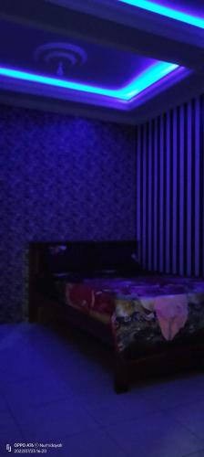 Postel nebo postele na pokoji v ubytování Homestay Sutrisno