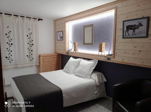 Ein Bett oder Betten in einem Zimmer der Unterkunft Casa Rural Felip