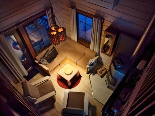 an overhead view of a living room with a table at Ruka Star in Ruka