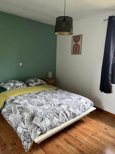 Postel nebo postele na pokoji v ubytování Aux vignes d’Arnaud
