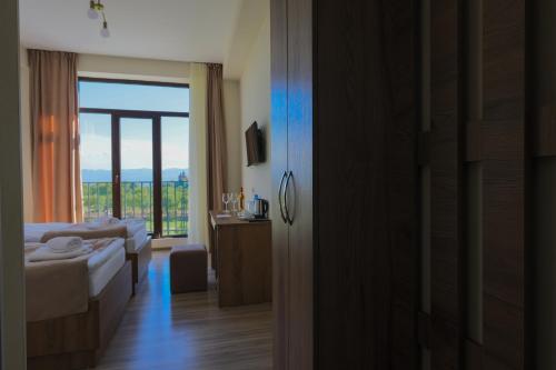 Katil atau katil-katil dalam bilik di In Gremi Hotel