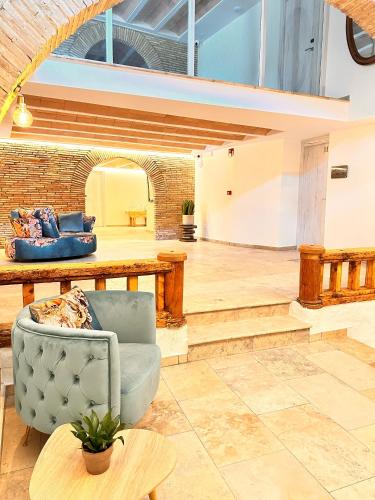 Posezení v ubytování Boutique Hotel Comtal Empuries