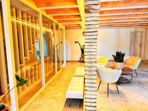 Posezení v ubytování Boutique Hotel Comtal Empuries