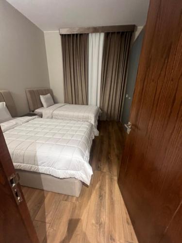 Ένα ή περισσότερα κρεβάτια σε δωμάτιο στο Luxury stay