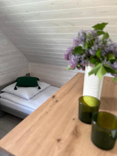 Ένα ή περισσότερα κρεβάτια σε δωμάτιο στο WIDOKOWO - Relaks, spokój i cisza
