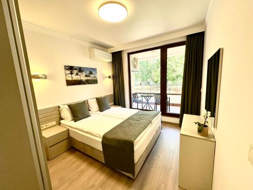 Cama o camas de una habitación en Apartment complex Mirage of Nessebar