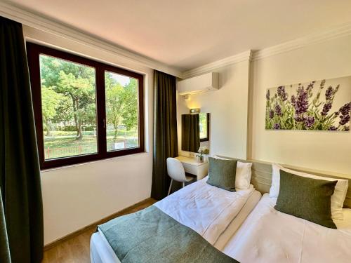 Cama o camas de una habitación en Apartment complex Mirage of Nessebar