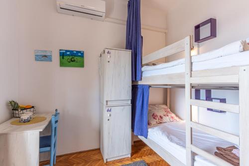 Postel nebo postele na pokoji v ubytování Hostel Casa La Cha