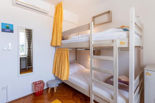 Postel nebo postele na pokoji v ubytování Hostel Casa La Cha