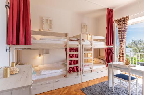 Postel nebo postele na pokoji v ubytování Hostel Casa La Cha