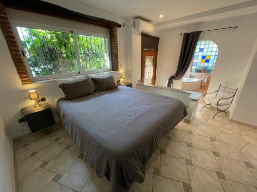 Posteľ alebo postele v izbe v ubytovaní Villa a 100 metros de la playa