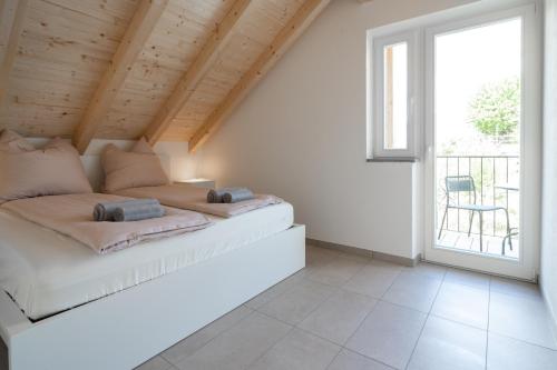 Postel nebo postele na pokoji v ubytování Schöne Wohnung an Toplage mit gratis Parkplatz!
