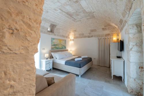 Postel nebo postele na pokoji v ubytování Villa Gli Arcangeli