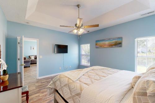 Ένα ή περισσότερα κρεβάτια σε δωμάτιο στο Goose Creek Retreat