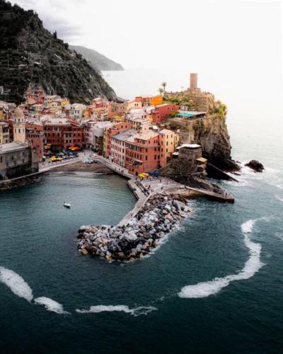 an aerial view of a town on a mountain at La Primula Vicinanza 5 Terre in Riccò del Golfo di Spezia