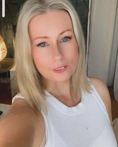 a young woman in a white tank top at Large room in excellent location double or two singles in Dublin