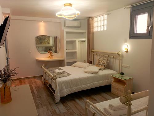 Ένα ή περισσότερα κρεβάτια σε δωμάτιο στο Relaxaki Apartment, Naxos town