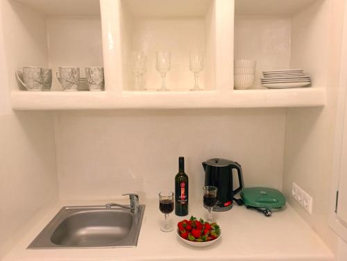 Η κουζίνα ή μικρή κουζίνα στο Relaxaki Apartment, Naxos town