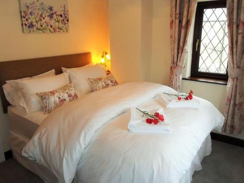 Katil atau katil-katil dalam bilik di Brookside Retreat, Dog Friendly