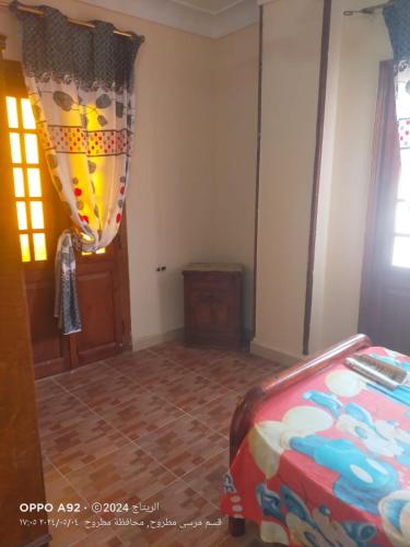 Postel nebo postele na pokoji v ubytování Marsa Matruh Chalets - Officers District C