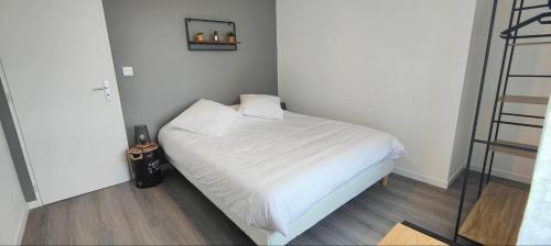 Appartements à thèmeにあるベッド