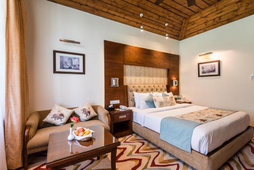 Voodi või voodid majutusasutuse The Anantmaya Resort toas