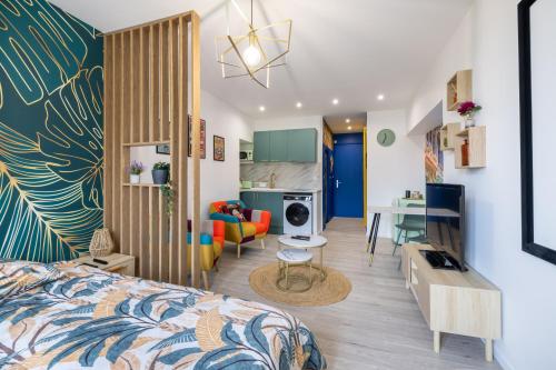 Postel nebo postele na pokoji v ubytování Rétro movies studio