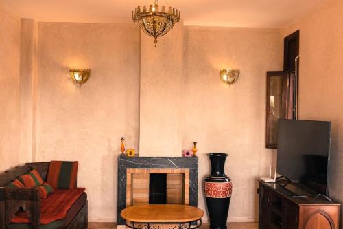 Posezení v ubytování Villa Taroub avec piscine et vue sur mer
