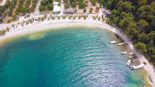 an aerial view of a beach with boats in the water at Apartman Natali in Kremena