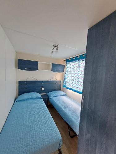 Ένα ή περισσότερα κρεβάτια σε δωμάτιο στο Agriturismo Alturetta