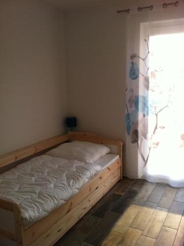 Giường trong phòng chung tại Ferienwohnung Zinnowitz