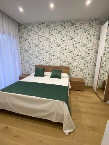 Ένα ή περισσότερα κρεβάτια σε δωμάτιο στο B&B Profumo di mare