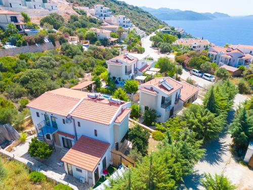 an aerial view of a small town with houses at Sea Garden Kaş Hotel in Kas