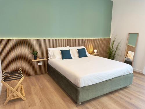Ένα ή περισσότερα κρεβάτια σε δωμάτιο στο Magrì Comfort House