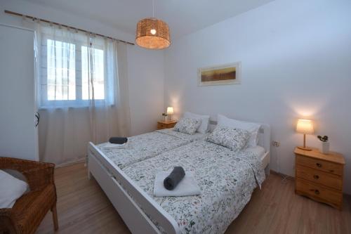 Postel nebo postele na pokoji v ubytování Holiday Home Angela