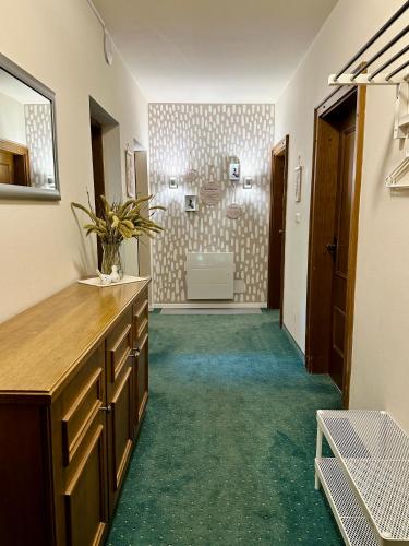a hallway with a bathroom with a sink at Berghof Werfenweng in Werfenweng