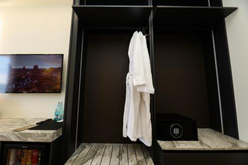 TV a/nebo společenská místnost v ubytování Hotel Adore