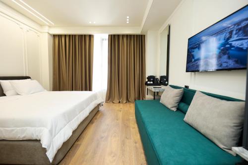 Postel nebo postele na pokoji v ubytování Hotel Adore