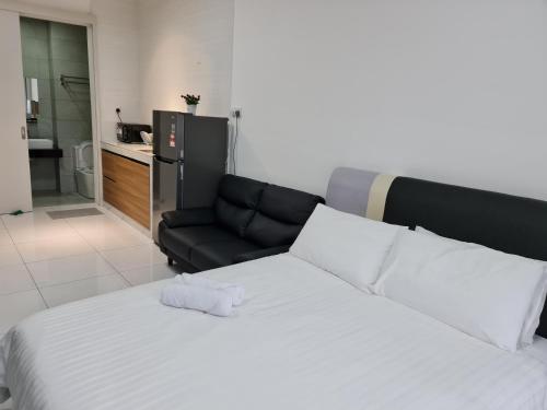 Postel nebo postele na pokoji v ubytování Sky Tree Studio Apartment at Bukit Indah, Johor