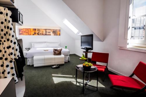 Katil atau katil-katil dalam bilik di Hotel Gat Rossio
