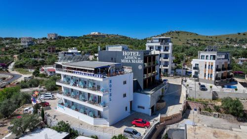 an aerial view of a building in a city at Hotel Mira Mare in Ksamil