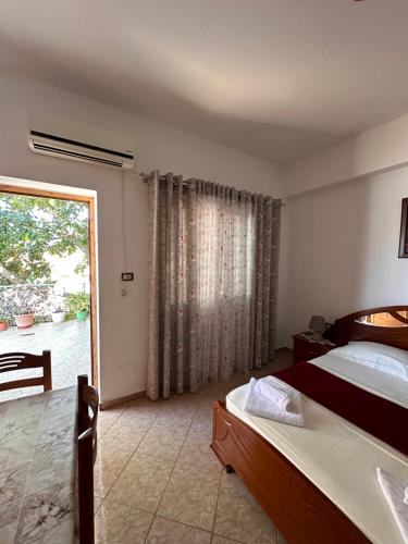 Postel nebo postele na pokoji v ubytování Albi's Guesthouse