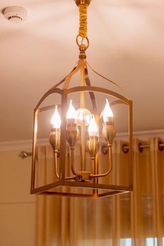 a chandelier hanging from a ceiling at Mountain View Hotel & Apartment in Kigali